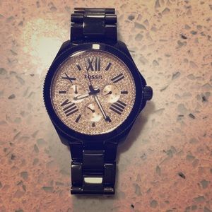 Black and gold fossil watch